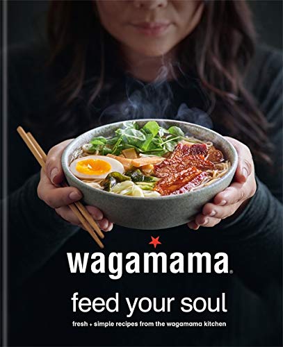 Cookbook cover featuring a bowl of ramen held by a person.