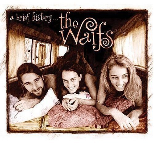 "CD cover with sepia-toned image of three people in a train carriage."