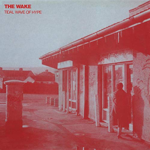 Red album cover featuring a building and a person seen from behind.