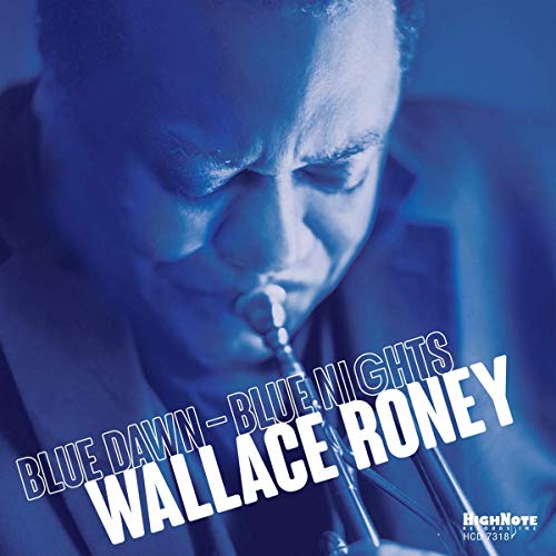 "Jazz album cover with a man playing trumpet, blue-toned image, white text."