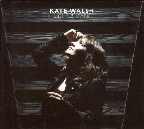 CD cover for Kate Walsh’s “Light & Dark” featuring a portrait of the artist.