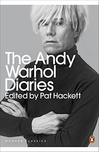 Book cover featuring a black and white portrait of Andy Warhol with arms crossed.
