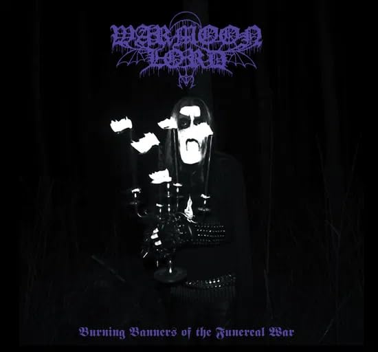 A person in corpse paint holds a candelabra in a dark, forested setting.