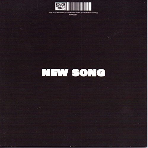 Black vinyl record sleeve with white text “NEW SONG” and barcode.