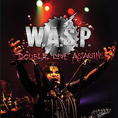 Wasp album cover: singer with arms raised on stage, red and black.