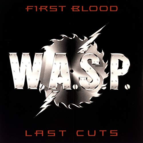 Silver "W.A.S.P." logo on a black background with red text above and below.