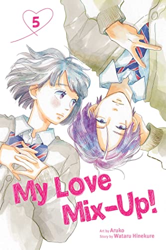 Manga volume cover with two young people in school uniforms.