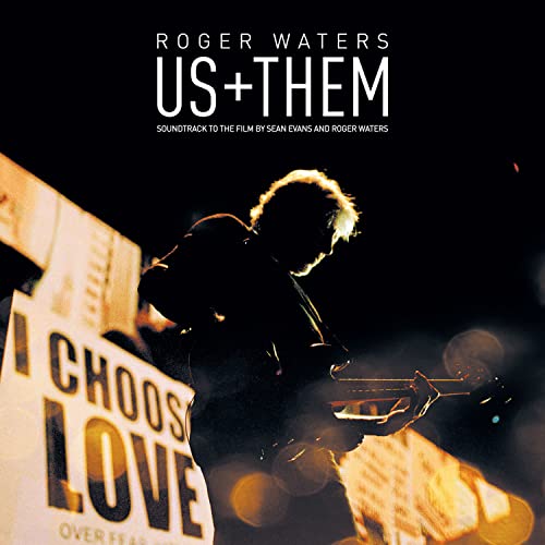 Roger Waters "Us + Them" CD cover with a silhouetted musician.