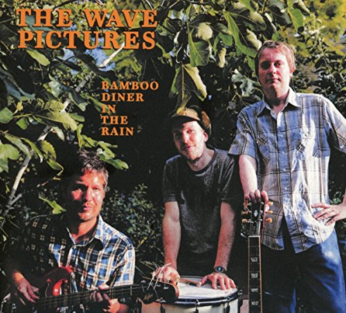 CD cover: three men with instruments amongst lush green foliage.