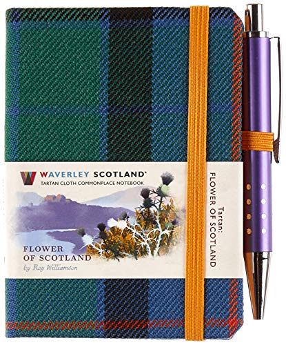 Tartan notebook with elastic band and purple pen resting beside it.