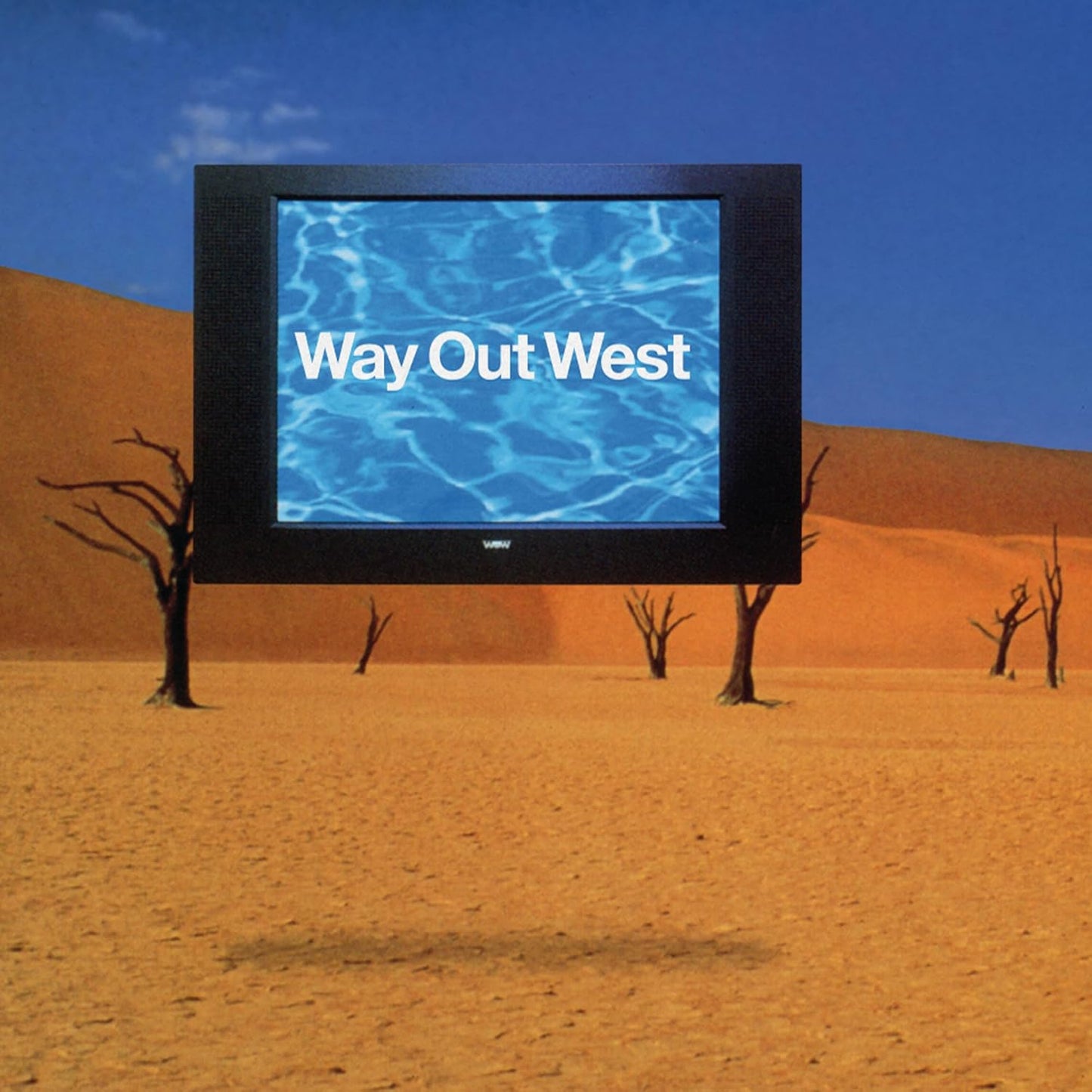 Television displaying water in a desert landscape, album cover art.