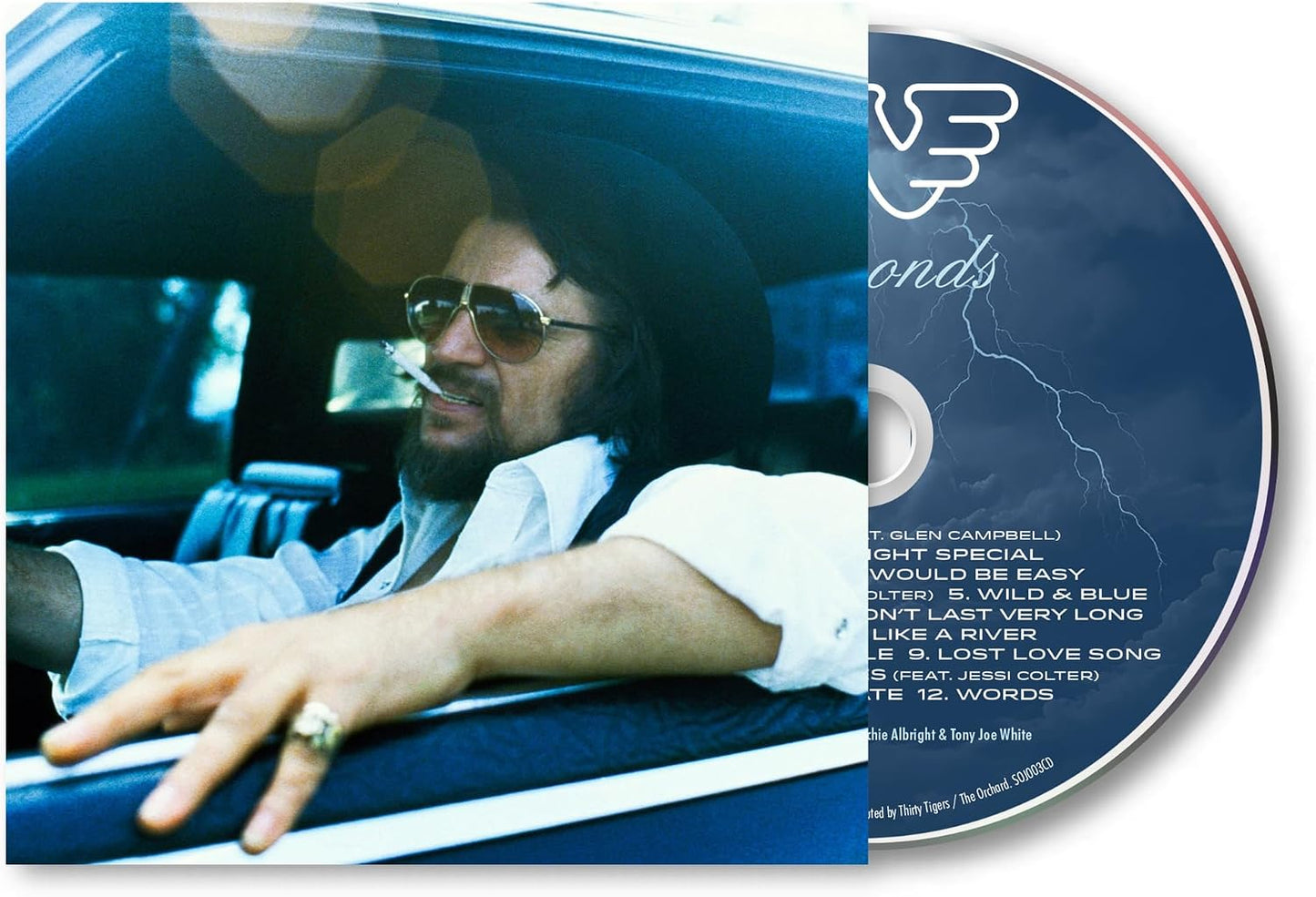 Waylon Jennings "Diamonds" CD cover featuring a portrait and tracklist.
