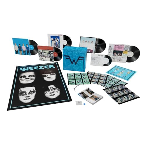 Weezer vinyl box set containing records, a poster, booklets, and various printed inserts.
