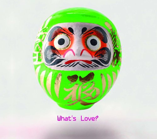 A bright green Daruma doll with gold lettering and the text What's Love below.