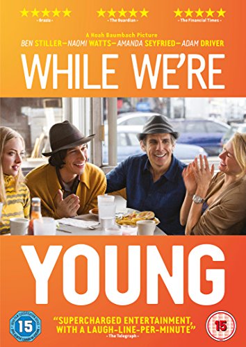 Movie poster for While We're Young with four people sitting at a restaurant table.