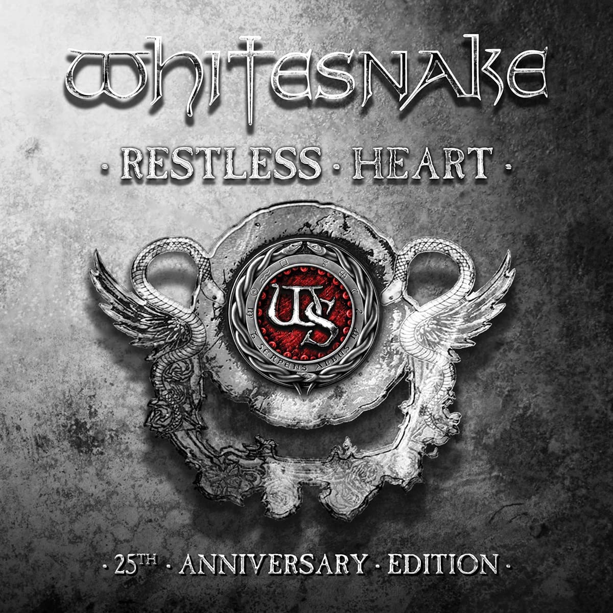 "Whitesnake's 'Restless Heart' CD cover featuring a silver emblem with wings and red center."