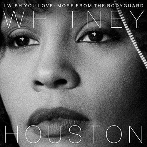 Close-up black and white portrait of Whitney Houston, album cover.