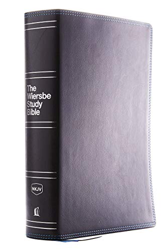 Black leathersoft Bible with silver lettering, spine visible, open to cover.
