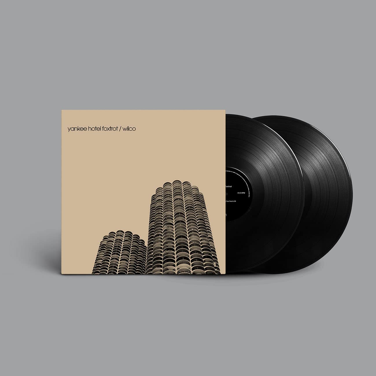 Wilco’s “Yankee Hotel Foxtrot” vinyl record with building cover art.
