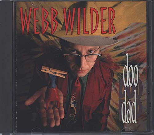 CD cover: man in hat and glasses holding a clothespin.