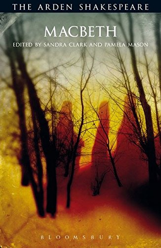 Cover of “Macbeth” by Shakespeare, featuring silhouetted trees against a fiery sky.