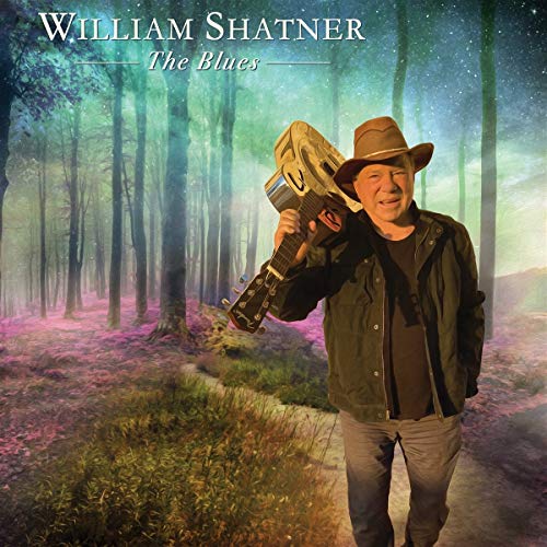 William Shatner holding a guitar, standing on a forest path, on a CD cover.