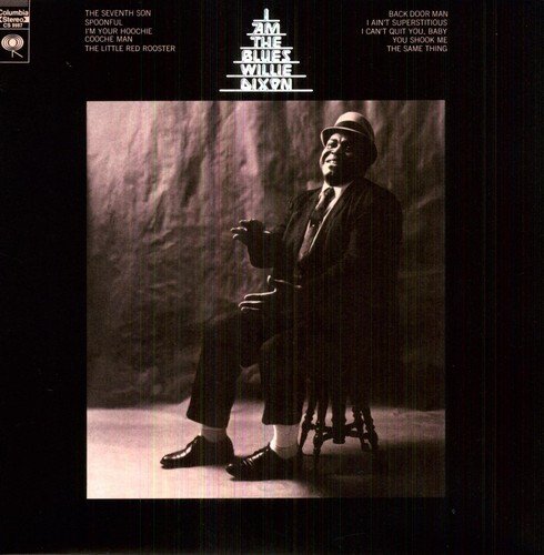 Black vinyl record cover with Willie Dixon sitting on a stool, wearing a suit.