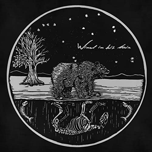 Black and white CD cover with a bear, tree, and fish skeletons.