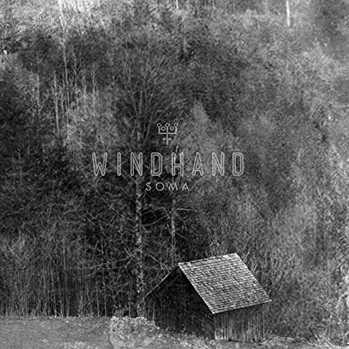 Black and white album cover with forest, cabin, and band name "Windhand".