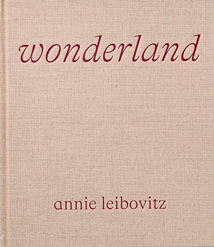 Beige linen-textured book cover with red title "wonderland" by Annie Leibovitz.