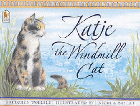 Cover of "Katje the Windmill Cat" featuring a calico cat in grass.