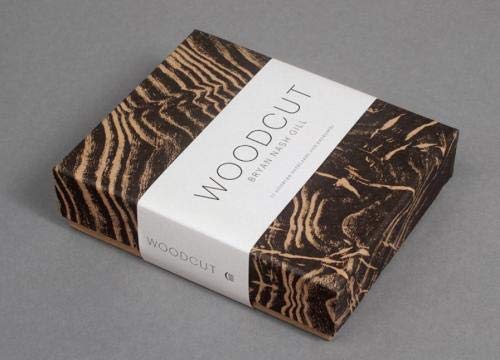 Stack of woodcut-patterned notecards with a white band label.