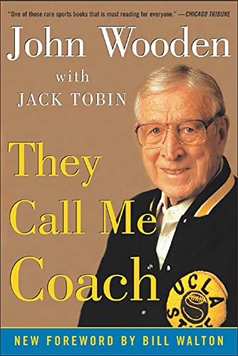 Book cover featuring a portrait of basketball coach John Wooden.