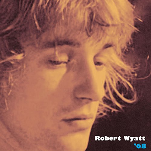 Close-up of Robert Wyatt with blonde hair, album cover for “’68”.