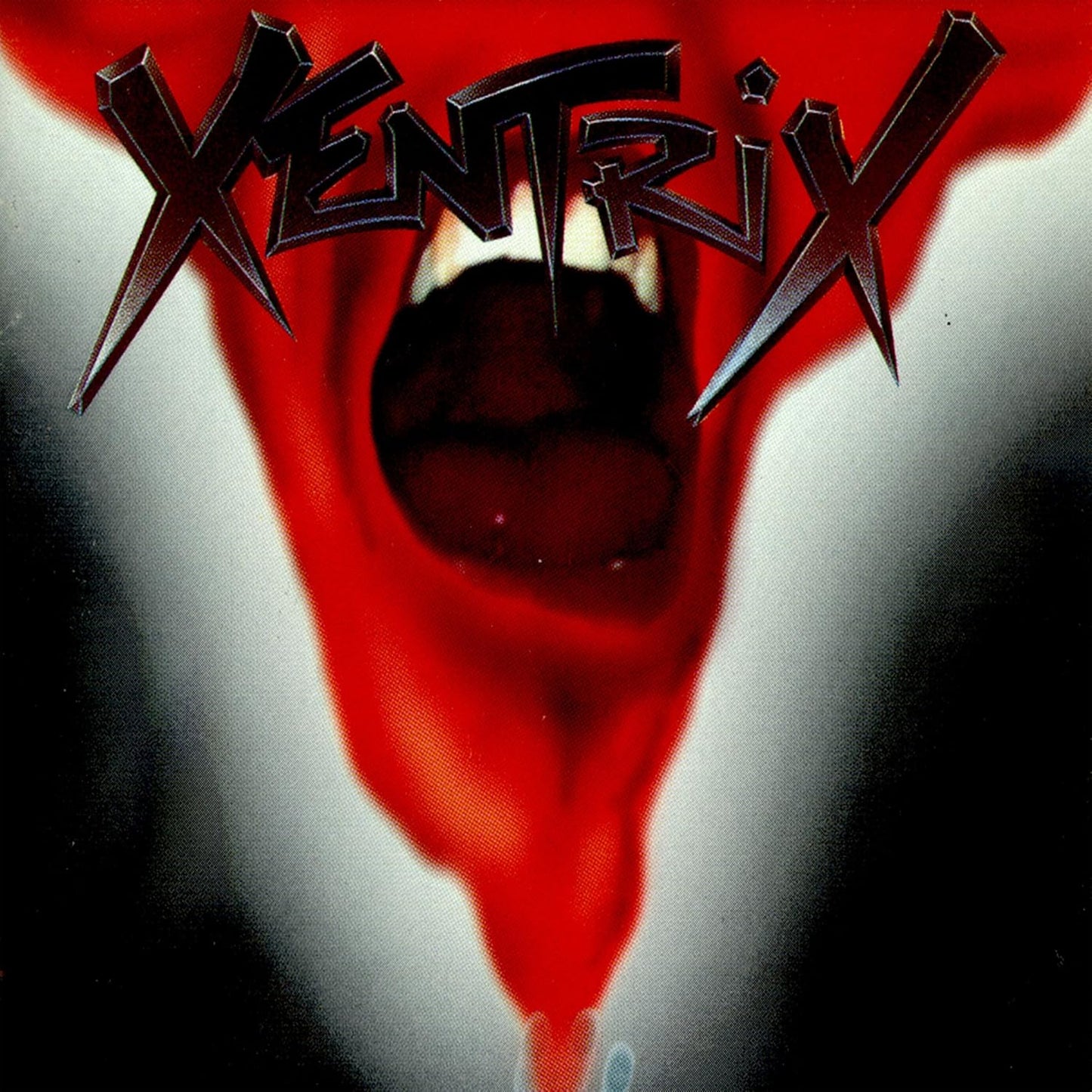Xentrix album cover: a screaming mouth with sharp teeth, red and black.