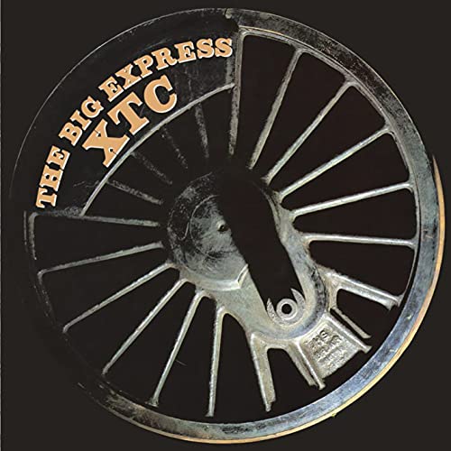 XTC album cover, “The Big Express,” featuring a silver train wheel.