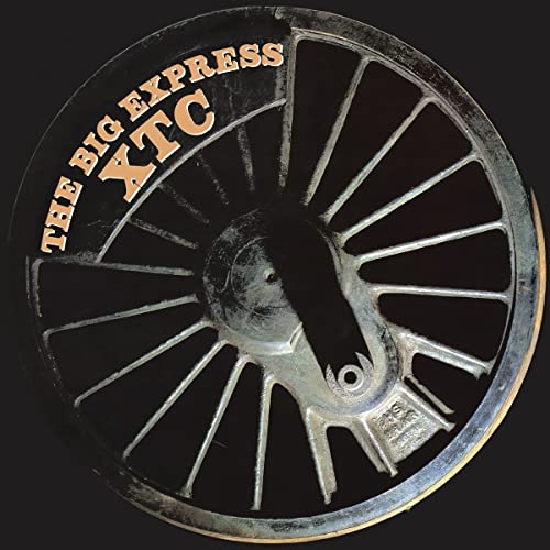Vinyl album cover showing a metal train wheel with text The Big Express XTC.