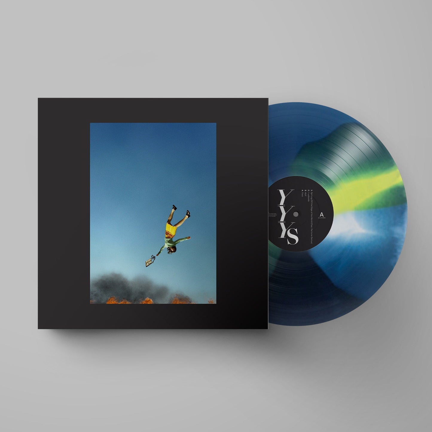 Yeah Yeah Yeahs vinyl record with colourful swirl and falling figure cover.