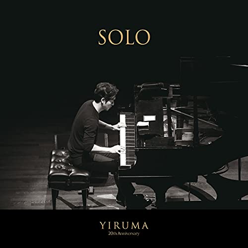 Yiruma playing a grand piano on the "SOLO" album cover.