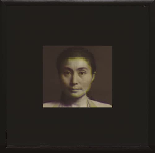 A framed portrait of Yoko Ono centered on a solid black background.