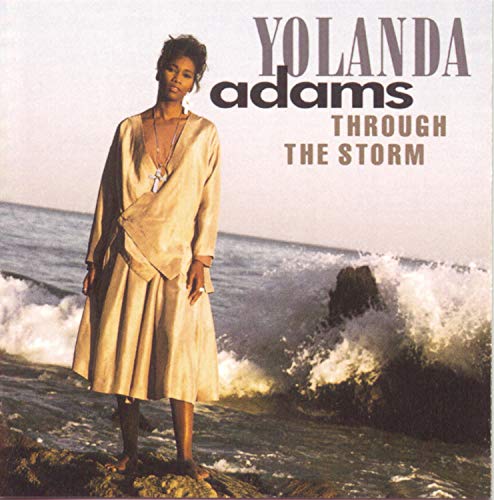 Yolanda Adams album cover, “Through the Storm,” with ocean backdrop.
