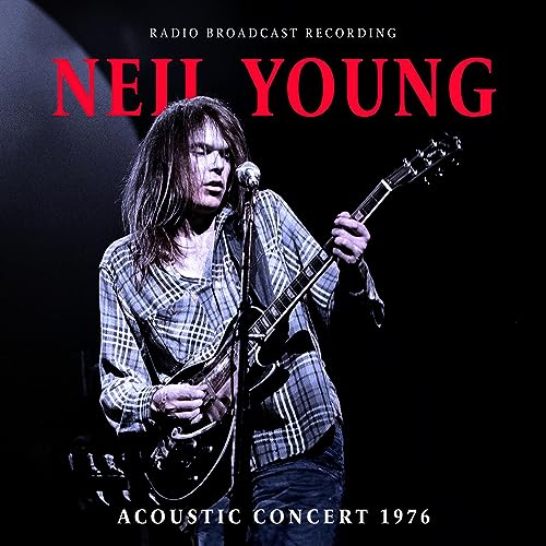 Neil Young playing acoustic guitar on stage, album cover art.
