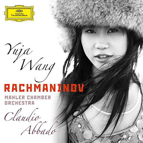 Black and white portrait of Yuja Wang wearing a fur hat with album text.