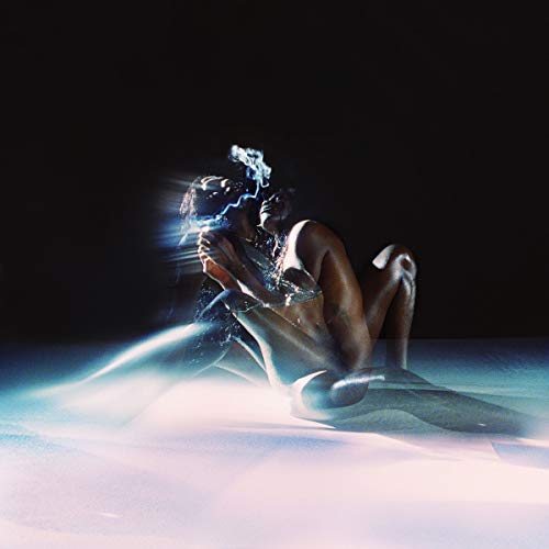 Album cover: two figures embrace amidst blue smoke and light.