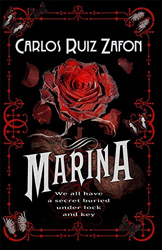 Book cover featuring a red rose, butterflies, and text on a black background.