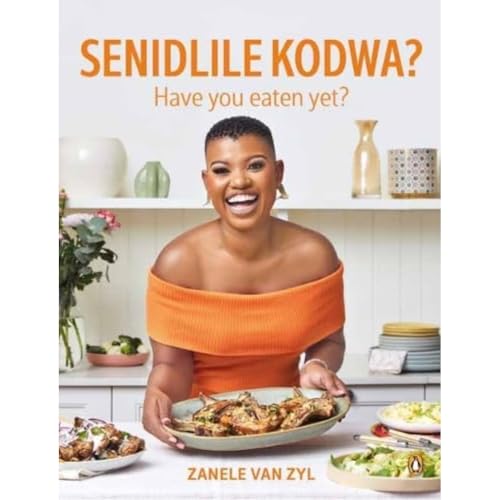 Book cover with a smiling woman holding a platter of food.