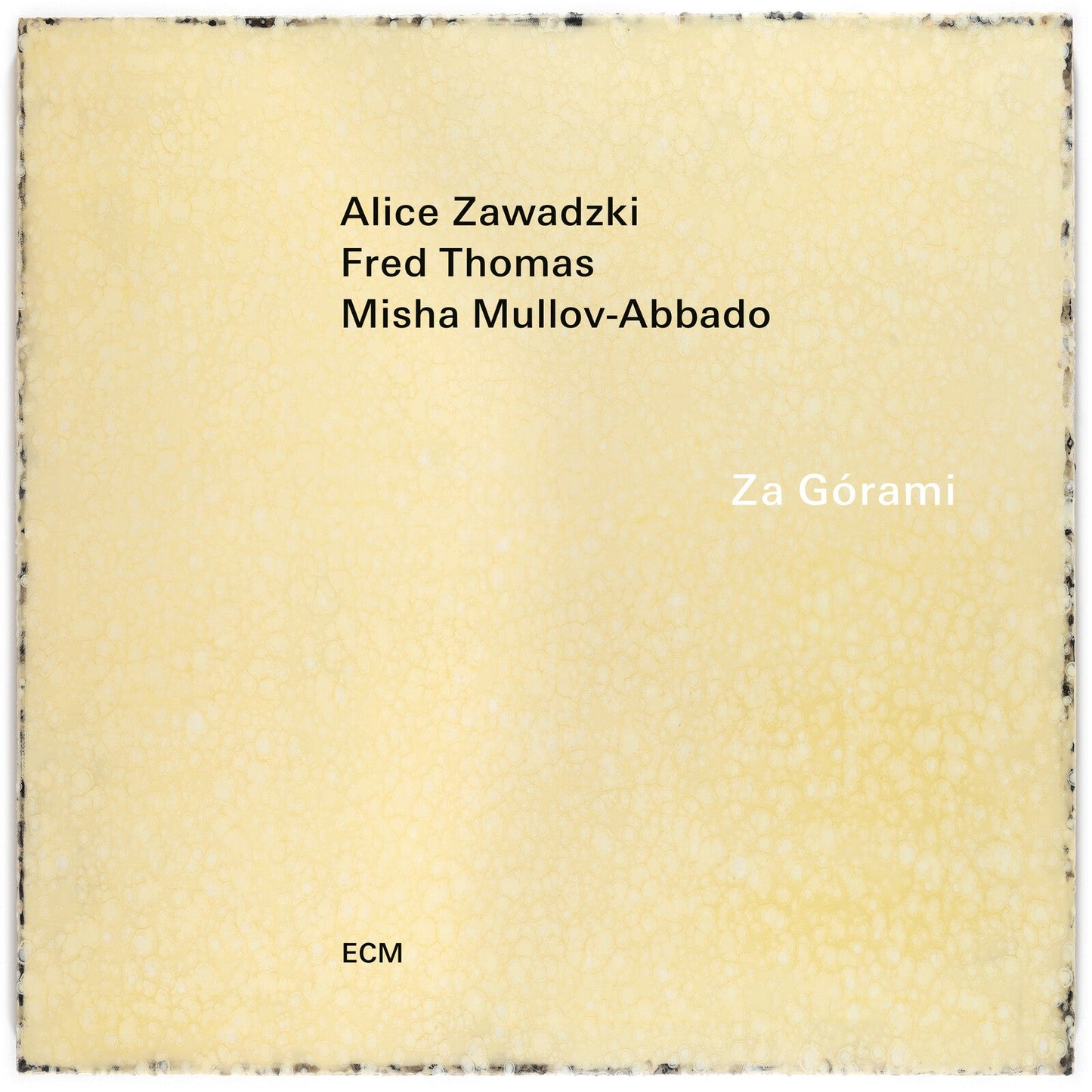 CD cover with textured cream background featuring artist names and title Za Górami.