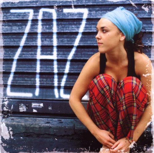 Zaz album cover featuring a woman with a blue headwrap and plaid shirt.
