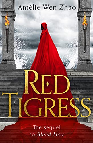 Book cover: hooded figure in red, stormy seascape, gold lettering.