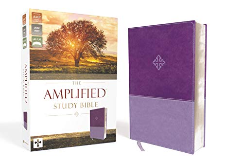Purple leather Bible with golden tree image on box, open pages visible.